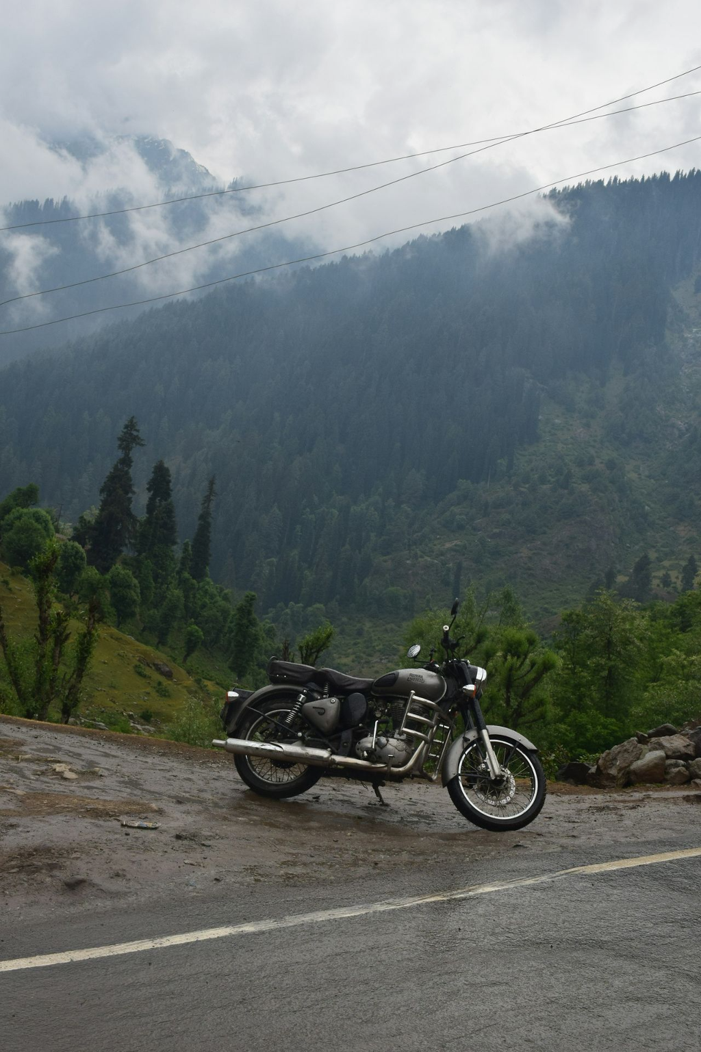 A motorcycle parked on the side of a road